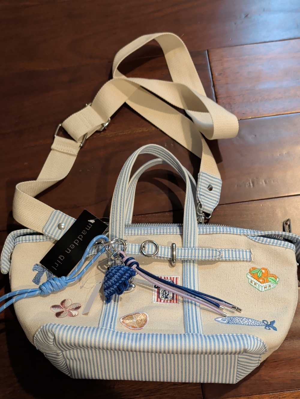 Madden Girl Cream Canvas Crossbody with Blue Pinstripes and Embroidered Accents
